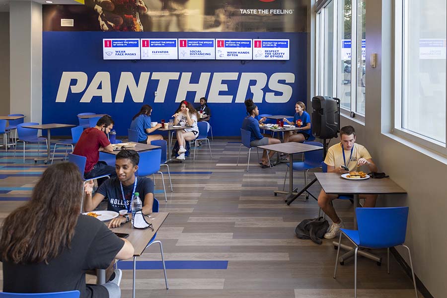 Students enjoy a dining hall meal at Piedmont Central Tuesday during move-in week.