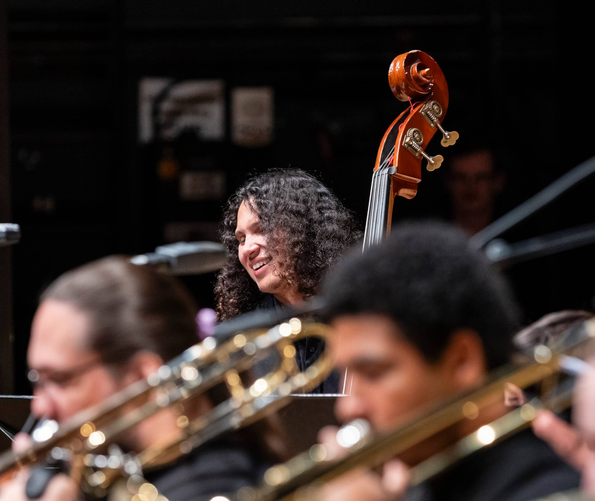 Bassist Chris Sanchez performs with an orchestra.