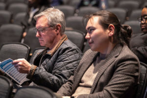 audience watching the panel