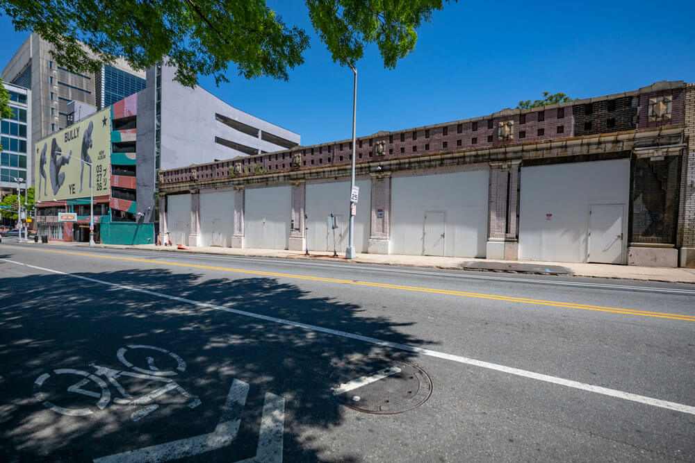 Photo of blank while walls along a streetfront building in downtown Atlanta.