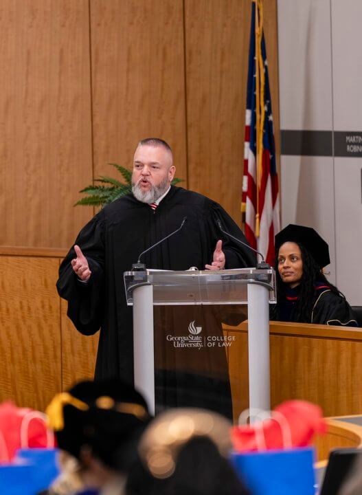 Judge Brian Fortner (J.D. '00) returned to his alma mater and recounted sitting in the graduates’ place 25 years earlier, when he earned his law degree as an “Urban Life” alumnus before the College of Law’s move to 85 Park Place.
