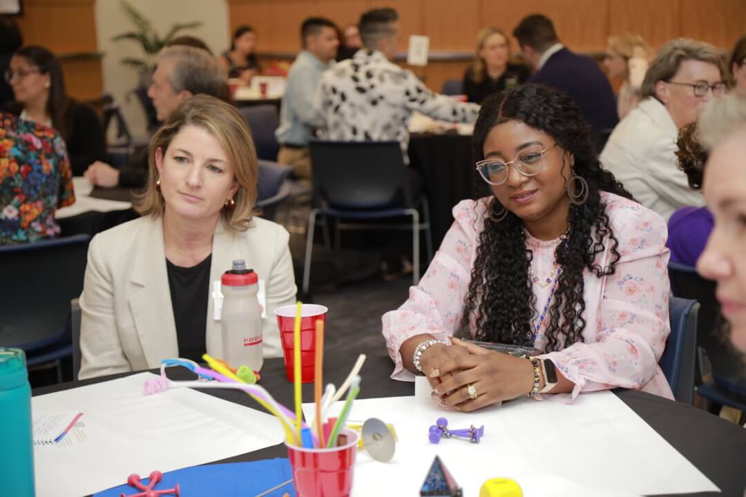 Health law professors work in small groups during the Jay Healey Teaching Workshop to share classroom-tested methods for promoting reflective practice among their students.