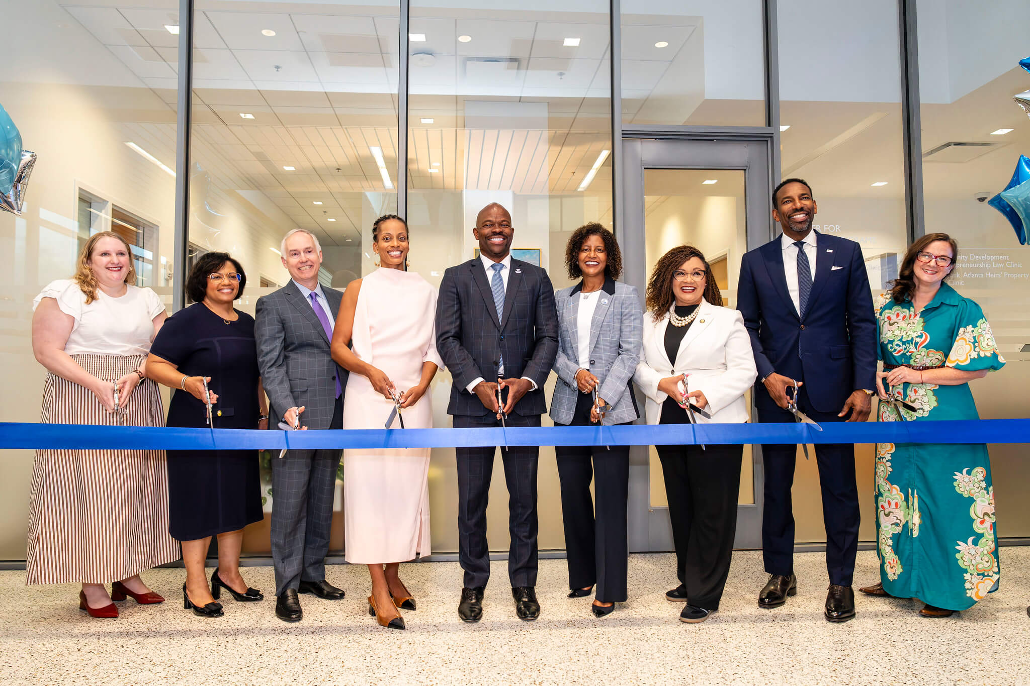 From left: Deputy Director of the Center for Access to Justice Alexandra Eichenbaum, Provost Nicolle Parsons-Pollard, President and CEO at Federal Home Loan Bank of AtlantaReggie O'Shields, Dean Courtney Anderson, GSU President Brian Blake, First Lady Dr. Bridget Blake, Congresswoman Nikema Williams (GA-05), Atlanta Mayor Andre Dickens.