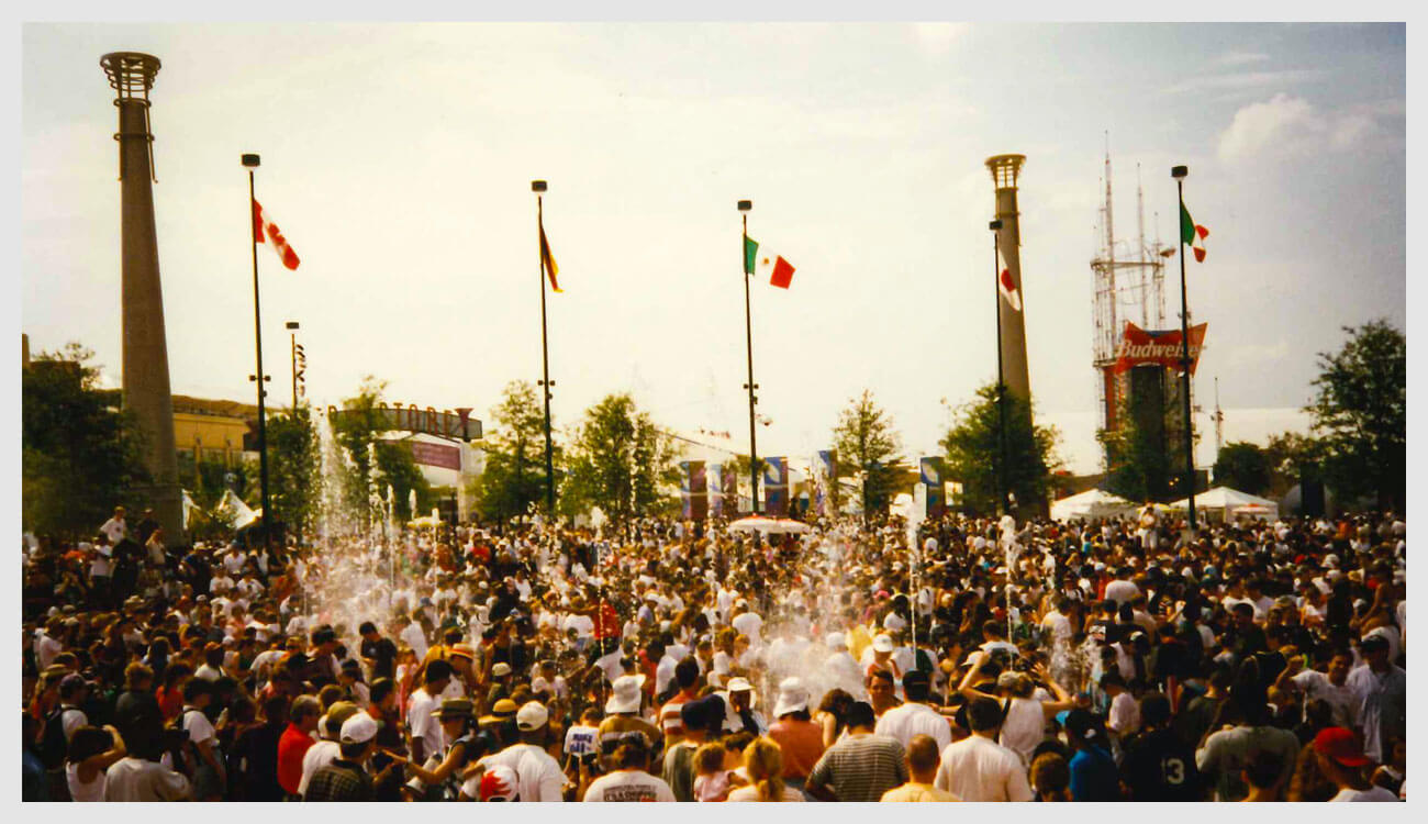Crowds seen among the spouting fountains of Centennial Olympic Park in 1996.