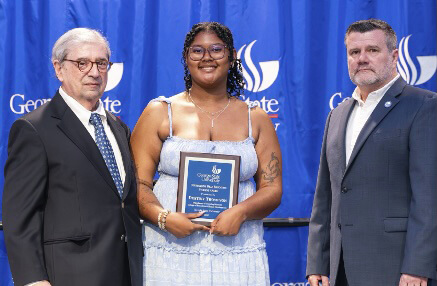 Honors Student Destiny Thompson receiving the Outstanding Deaf Education Student Award from the Department of Learning Sciences.