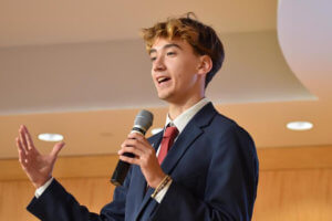 Honors student Caleb Gustavson briefs the Georgia State Student Government Association in his role as Bylaws Committee Chair, outlining the committee’s work and priorities for Fall 2024.