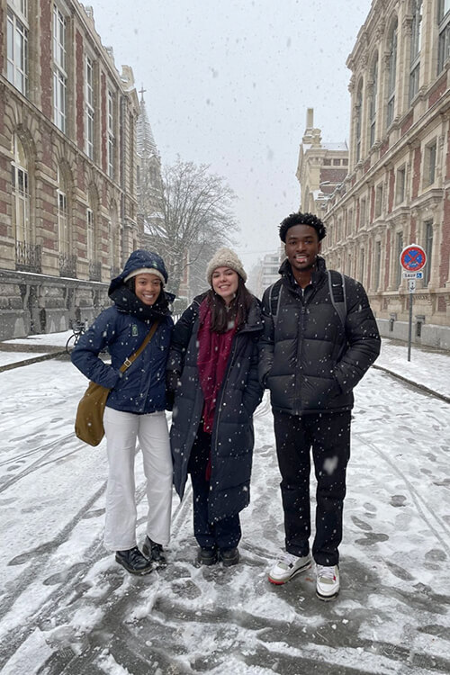 Garcia-Hector, left, and GSU students in front of Scienes Po Lille, the university where she studied in France.