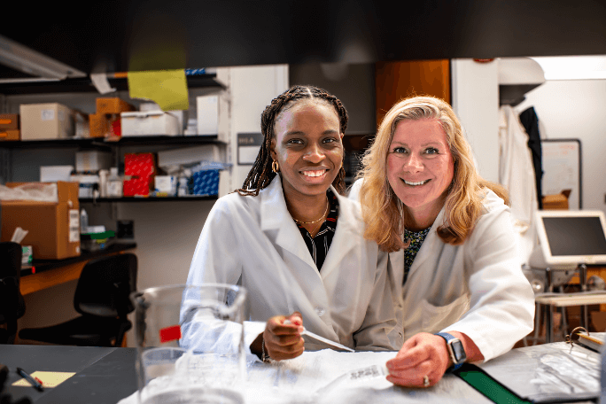 Iyanu in the lab with Dr. Murphy