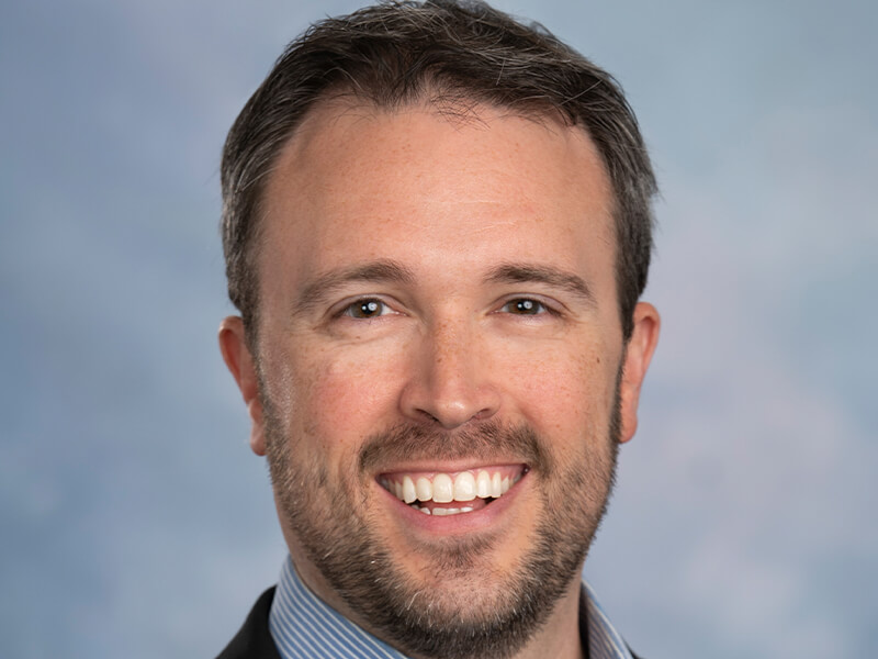 Portrait photo of T. Devin Reid.