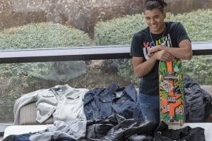 Student Collecting Coats to Make an Impact