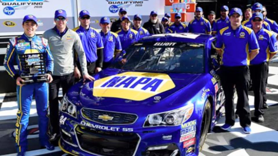 Chase Elliot and his crew surrounding his race car