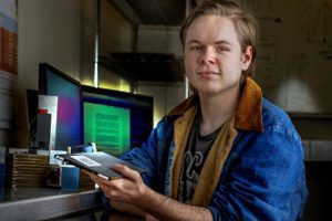 Physics Student Tests Tiles Used in Nuclear Physics Research