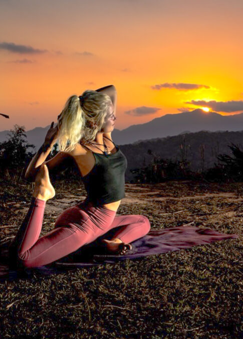 Outdoor shot of student practicing yoga