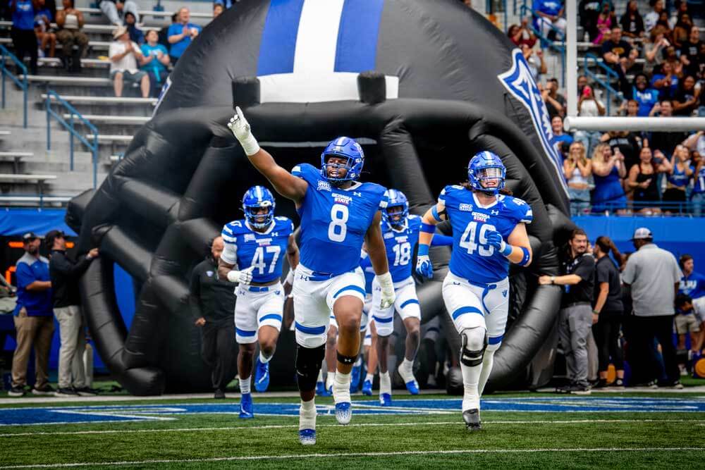 GSU football team running on to the field