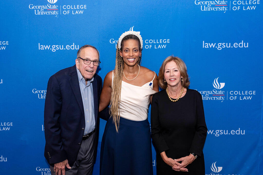 Dean Courtney Anderson welcomed Dean Emeritus Steven Kaminshine and Alumna Catherine C. Henson (J.D. '89) as fellow speakers at the ten-year anniversary event.