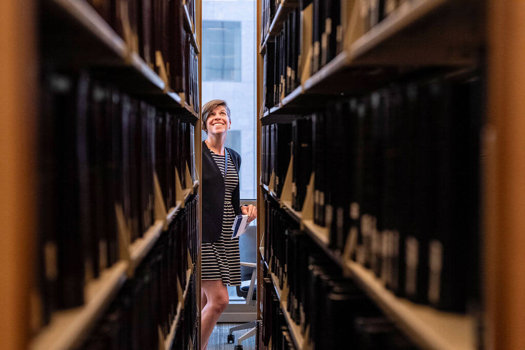Lawyering Foundations Professor Pamela Councill tours the Law Library during the ten-year anniversary event.