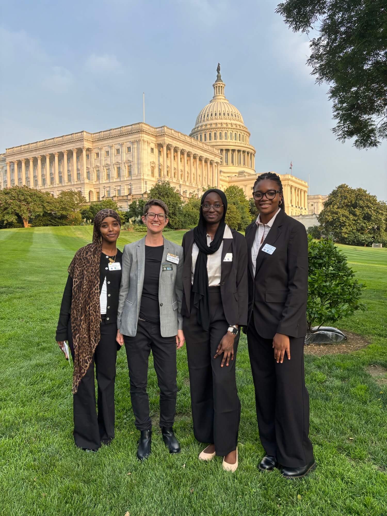 students and teacher standing in front of White House in Washington, D.C.