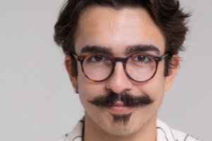 New Grad Builds Career Behind, Beyond the Camera