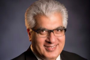 Economic Forecaster Rajeev Dhawan Receives Fellow of AUBER Award