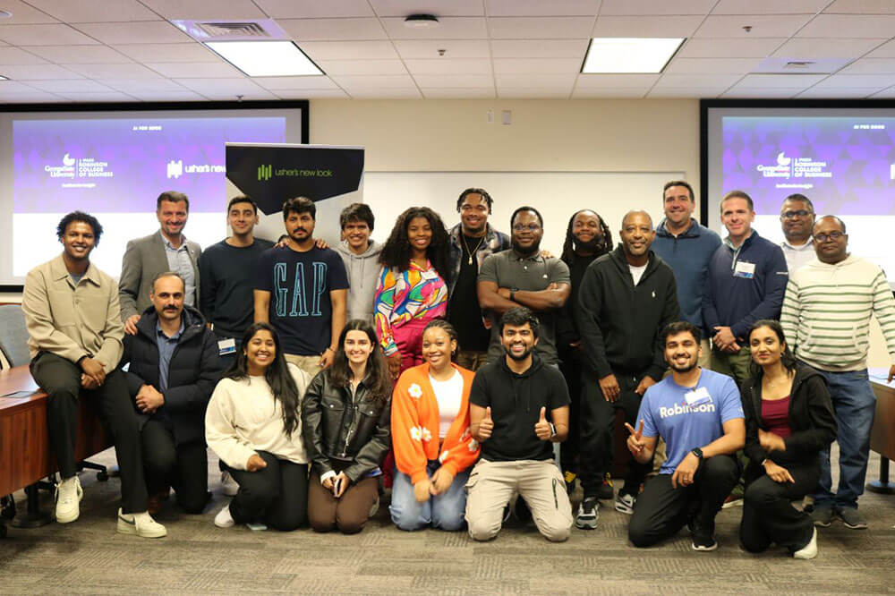 Emon Hill is pictured with fellow participants at a hackathon offered through a partnership between Georgia State and Usher's New Look.