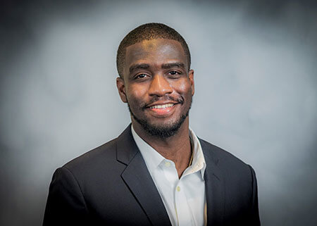 headshot of Malcolm Stephen, who earned an MBA with a concentration in business analytics and a Graduate Certificate in Generative AI and Machine Learning for Business in 2023