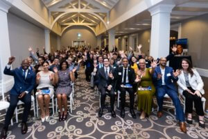 Seated crowd of GSU alumni and staff