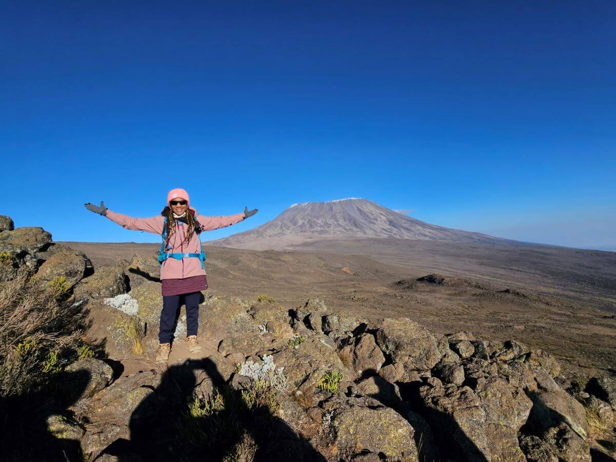 A photo of Bowen beginning her ascent of Mount Kilimanjaro.