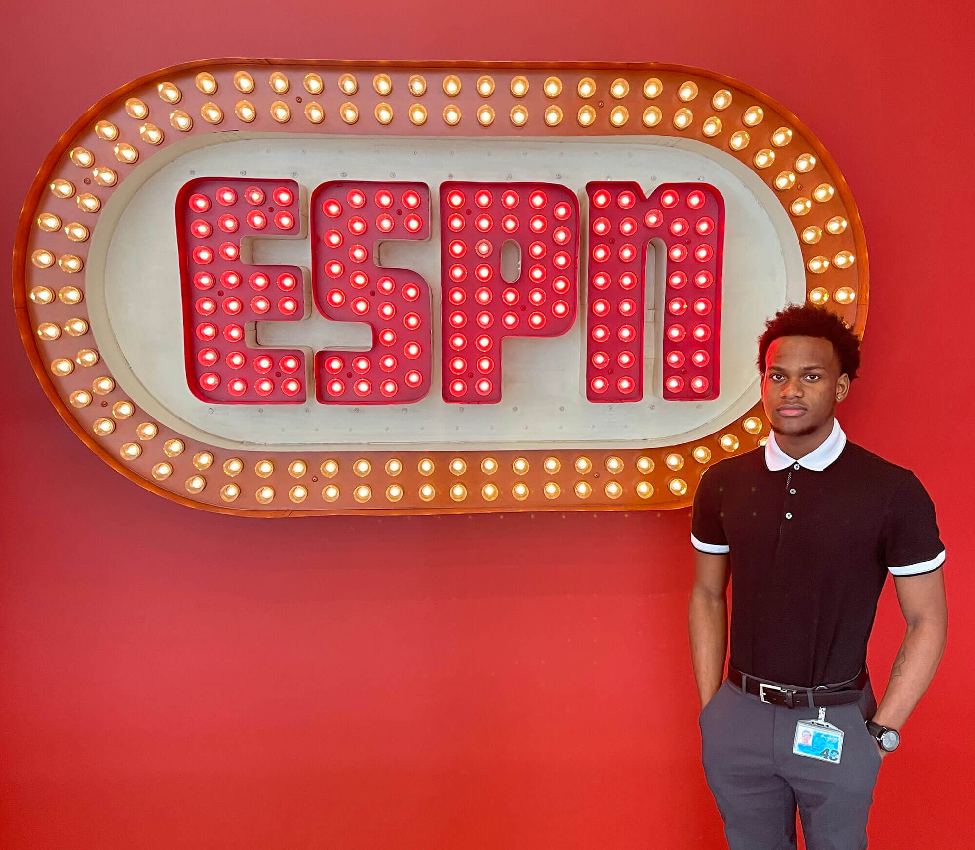 Picture of Roger Max in front of ESPN sign