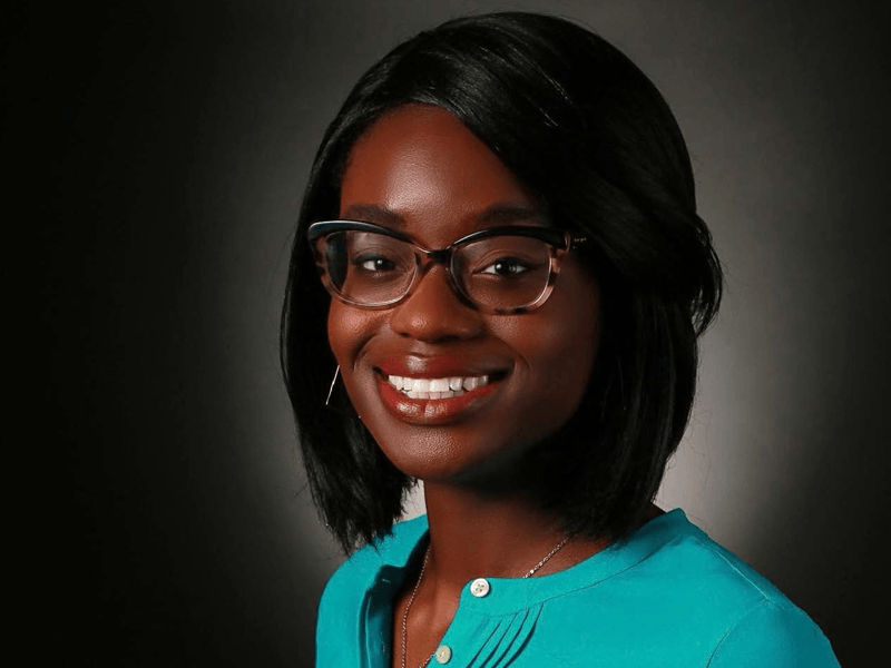A professional headshot of Georgia State alumna Yvonne Ogbonmwan, who utilizes her neuroscience training to design and manage global clinical trials as a senior global setup manager..