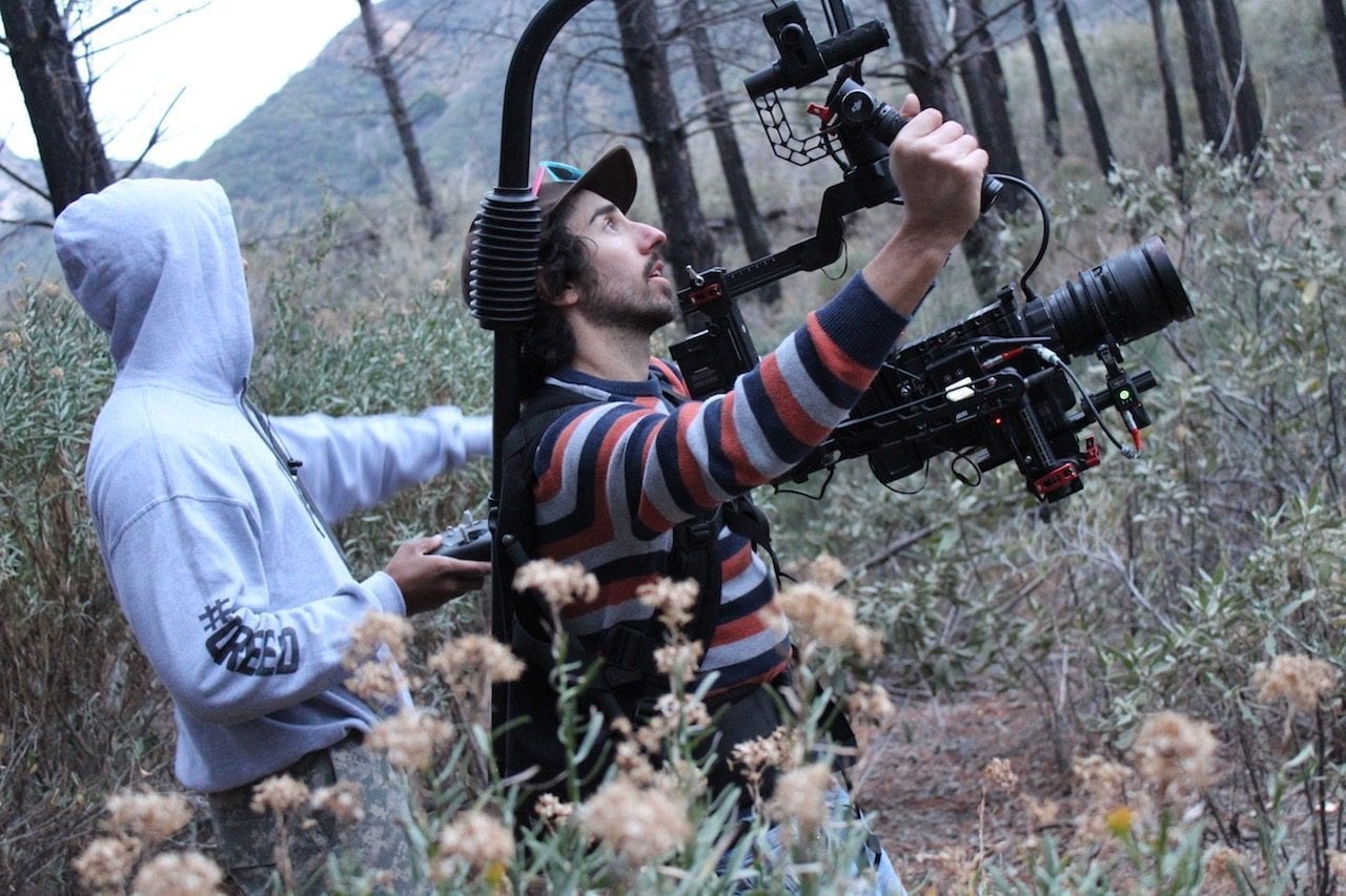 Director of Photography Mario Contini during production. Photo by Lovell Johnson.